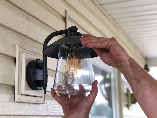DIY porch light makeover. How to replace outdated and ugly porch fixtures on a budget.