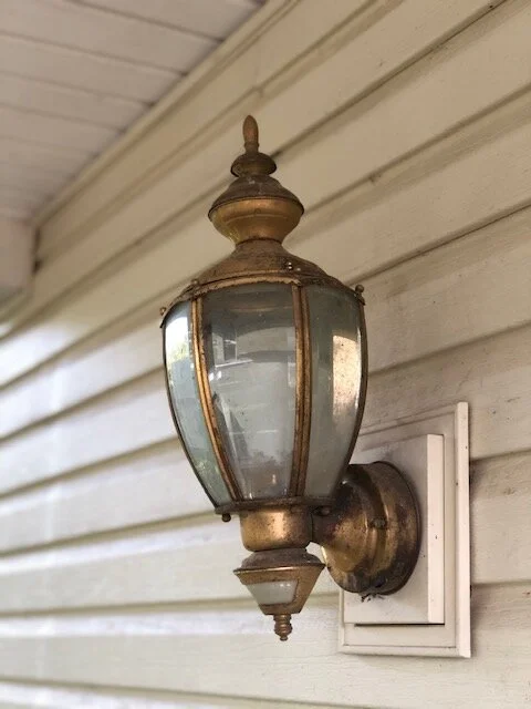 DIY porch light makeover. How to replace outdated and ugly porch fixtures on a budget.
