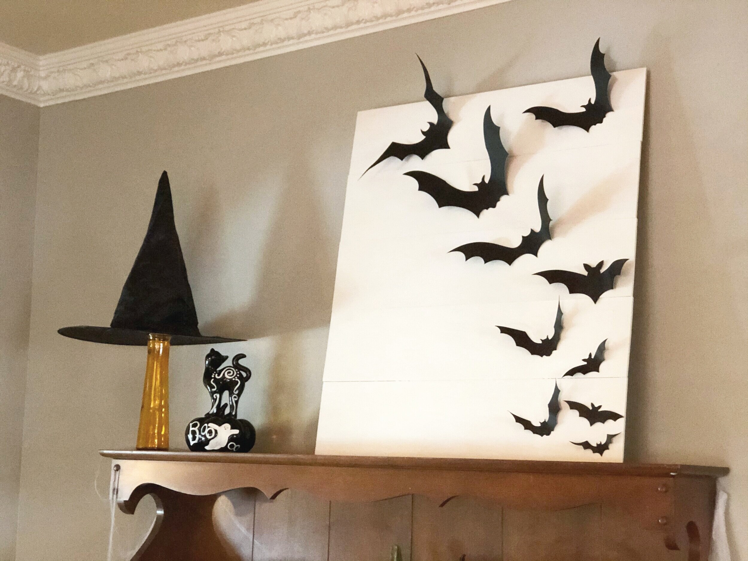 How to make an easy and cute Halloween decoration using a Dollar Tree vase and a witch hat. DIY Halloween decor using your Cricut cutting machine. Make your own adorable witch hat Halloween decoration.