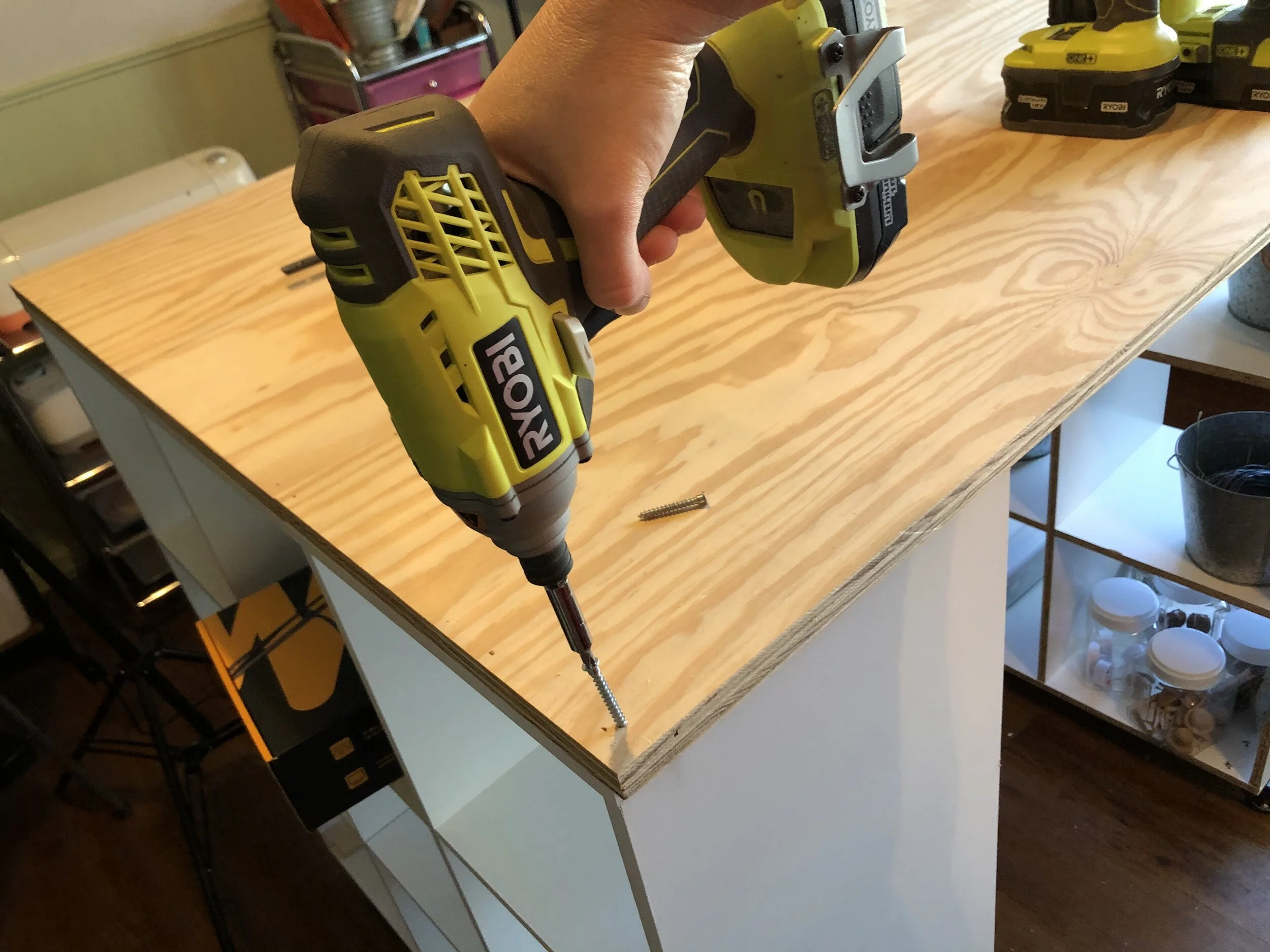 How to make a rolling craft desk on a budget. DIY Amazon 9 cube organizer standing tall craft desk. Non ikea craft desk craft.