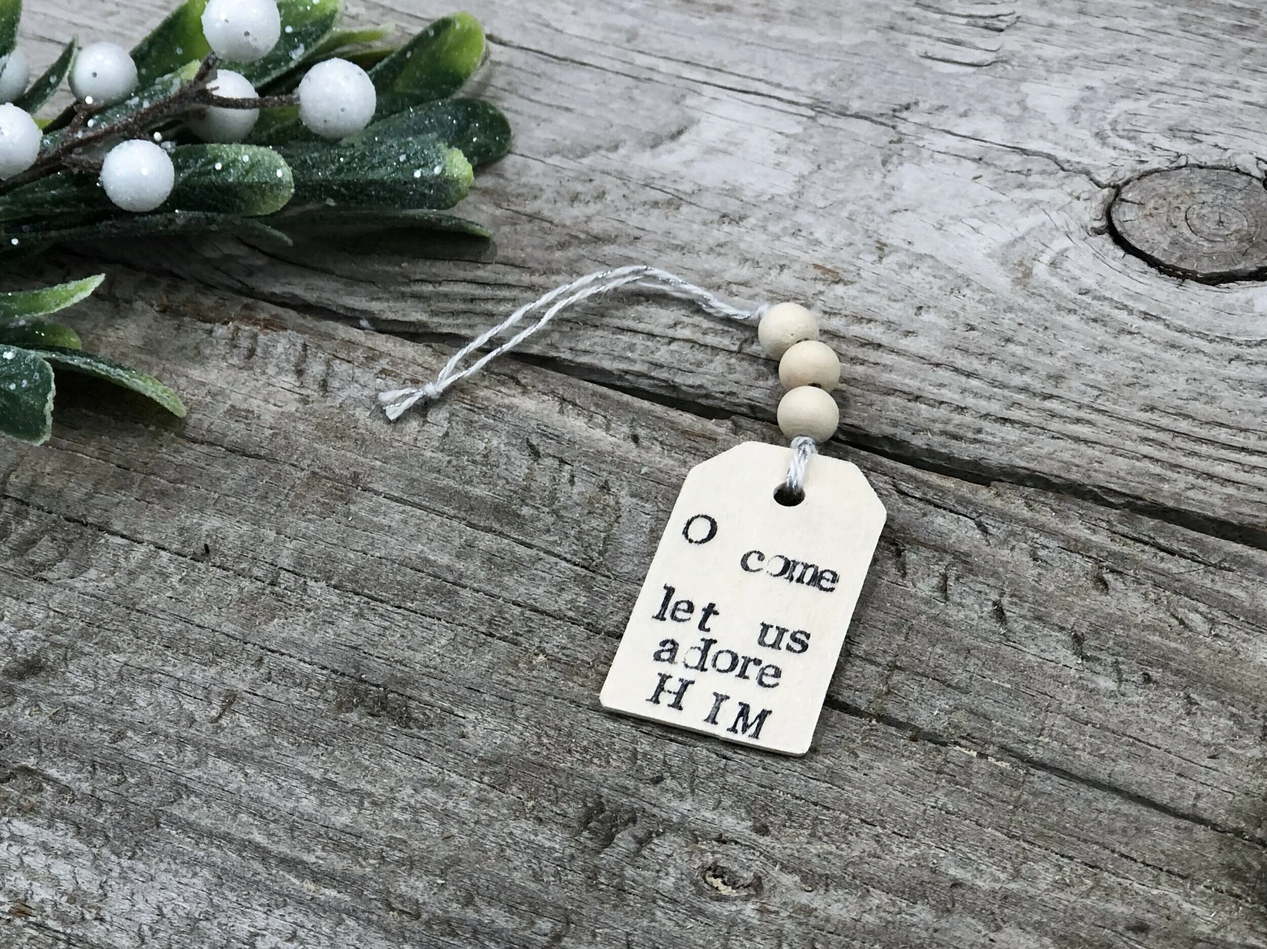 How to make a wood tag Christmas ornament. DIY Christmas ornament with wood beads. How to stamp on wood. O come let us adore Him Christmas DIY.