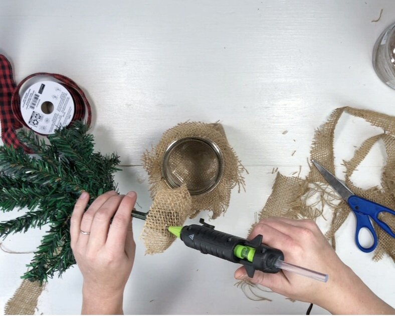 DIY Dollar Tree farmhouse Christmas tree. What to do with the mini Christmas trees from the dollar tree. Easy way to use the cheap Christmas trees from the dollar store. Rustic farmhouse Christmas decor on a budget.
