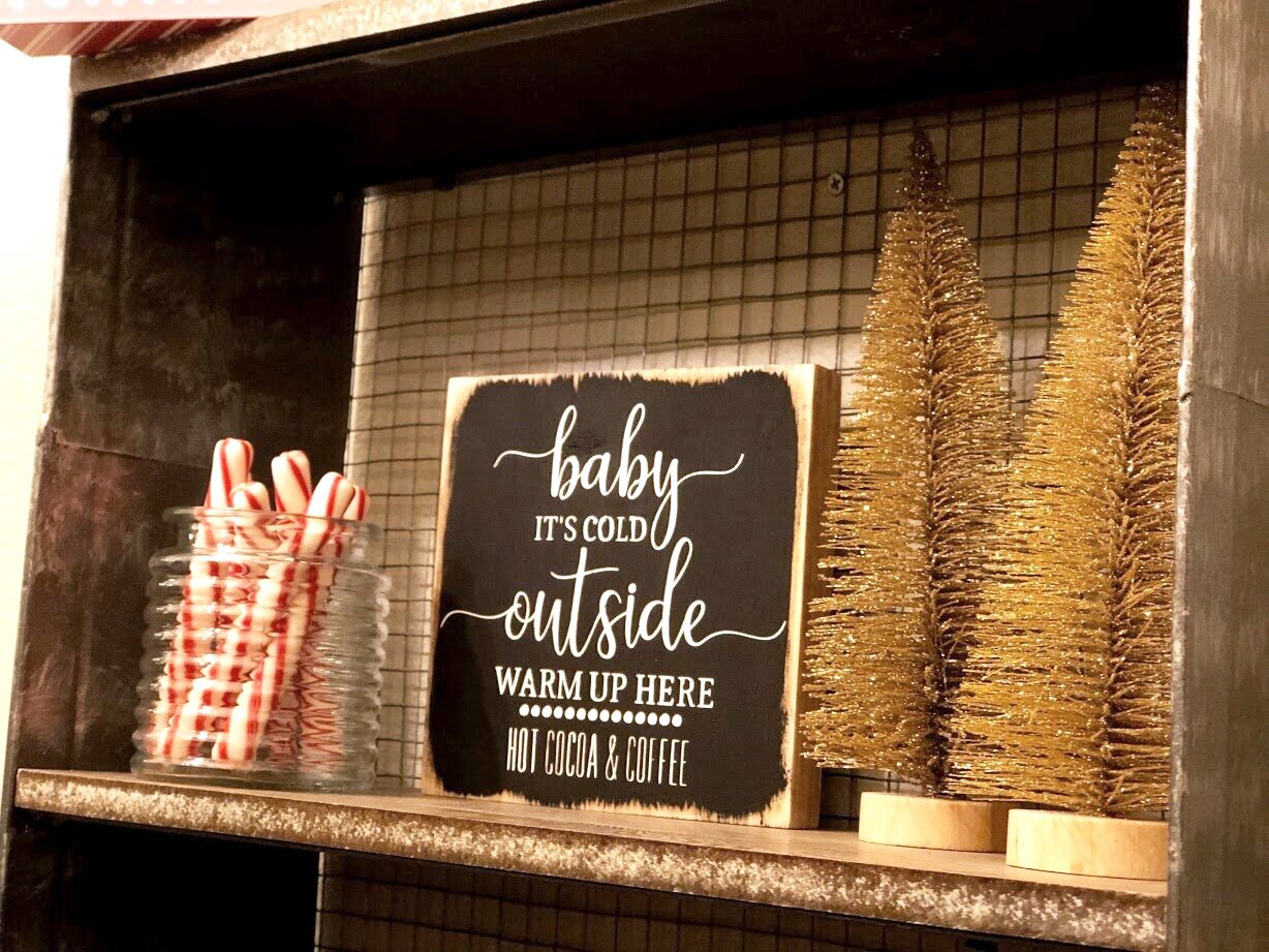 DIY baby it's cold outside warm up here hot cocoa & coffee bar wood sign. Free SVG for winter coffee bar sign. How to stencil on wood with no paint bleed. DIY wood sign painted stenciled sign with acrylic paint and oramask stencil film.