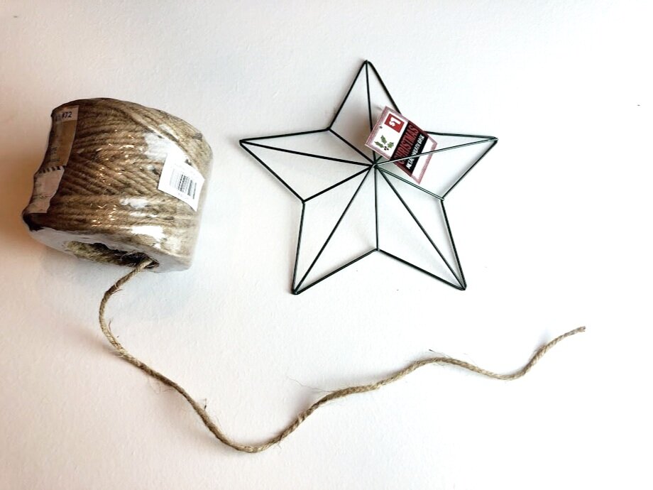 DIY dollar store Christmas decor. Christmas decorations on a budget. How to make a rustic farmhouse style star using twine or just and a wire star form.