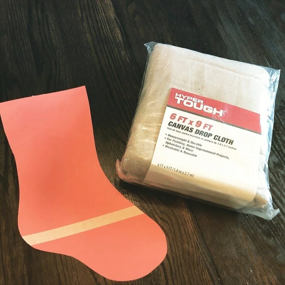 How to have a stress free stocking party with your kids. Make cute Christmas stockings out of drop cloths. DIY Christmas stockings plus a free sock stocking SVG to use with your Cricut.