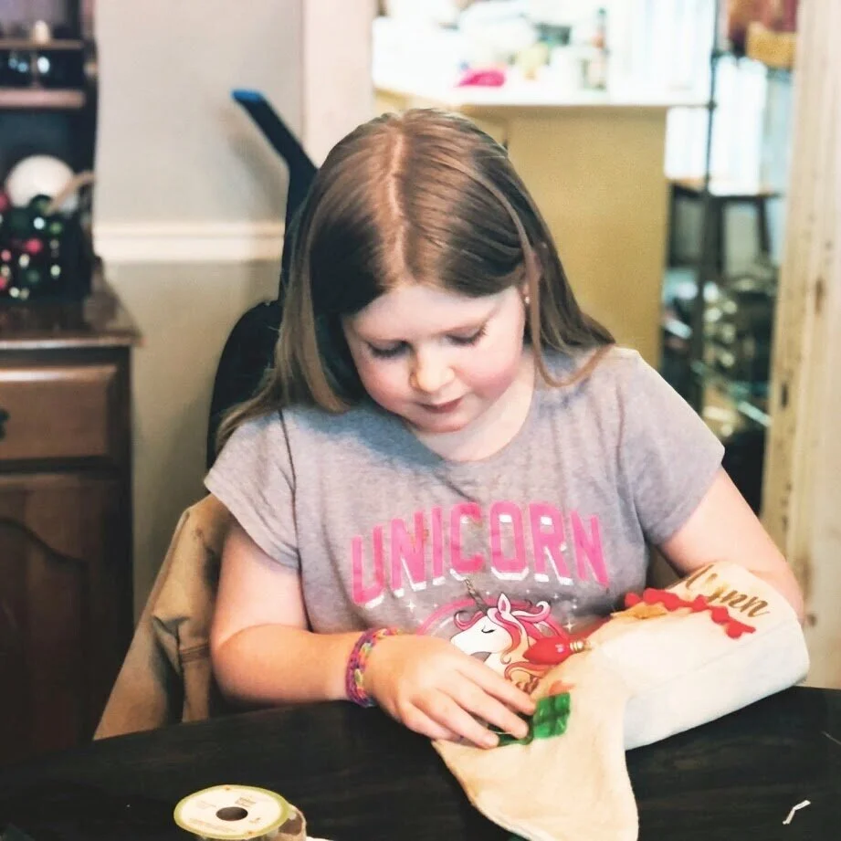 How to have a stress free stocking party with your kids. Make cute Christmas stockings out of drop cloths. DIY Christmas stockings plus a free sock stocking SVG to use with your Cricut.