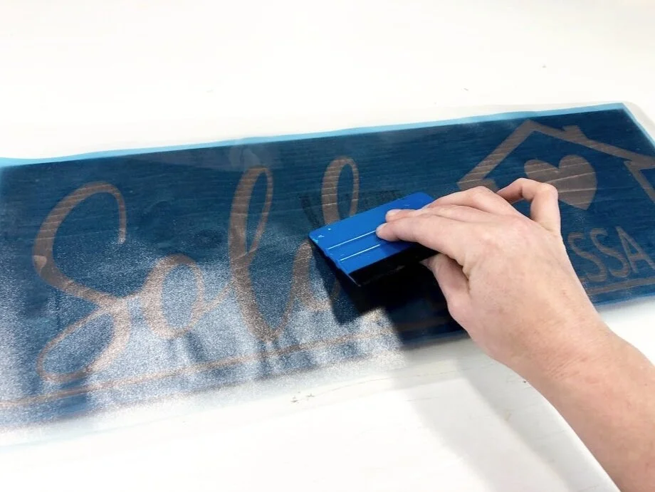 DIY sold by realtor sign using your Cricut or Silhouette cutting machine. Use this free SVG to make a realtor sold by sign photo opp prop. DIY painted wood sign for a real estate agent gift.