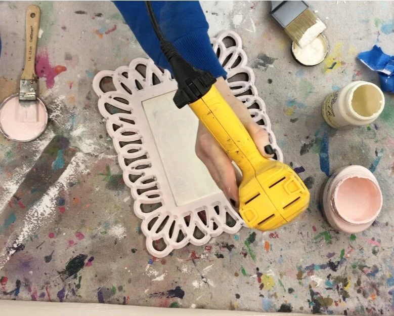 DIY Hobby Lobby clearance picture frame makeover. How to use Dollar Tree office clips to makeover an old picture frame.
