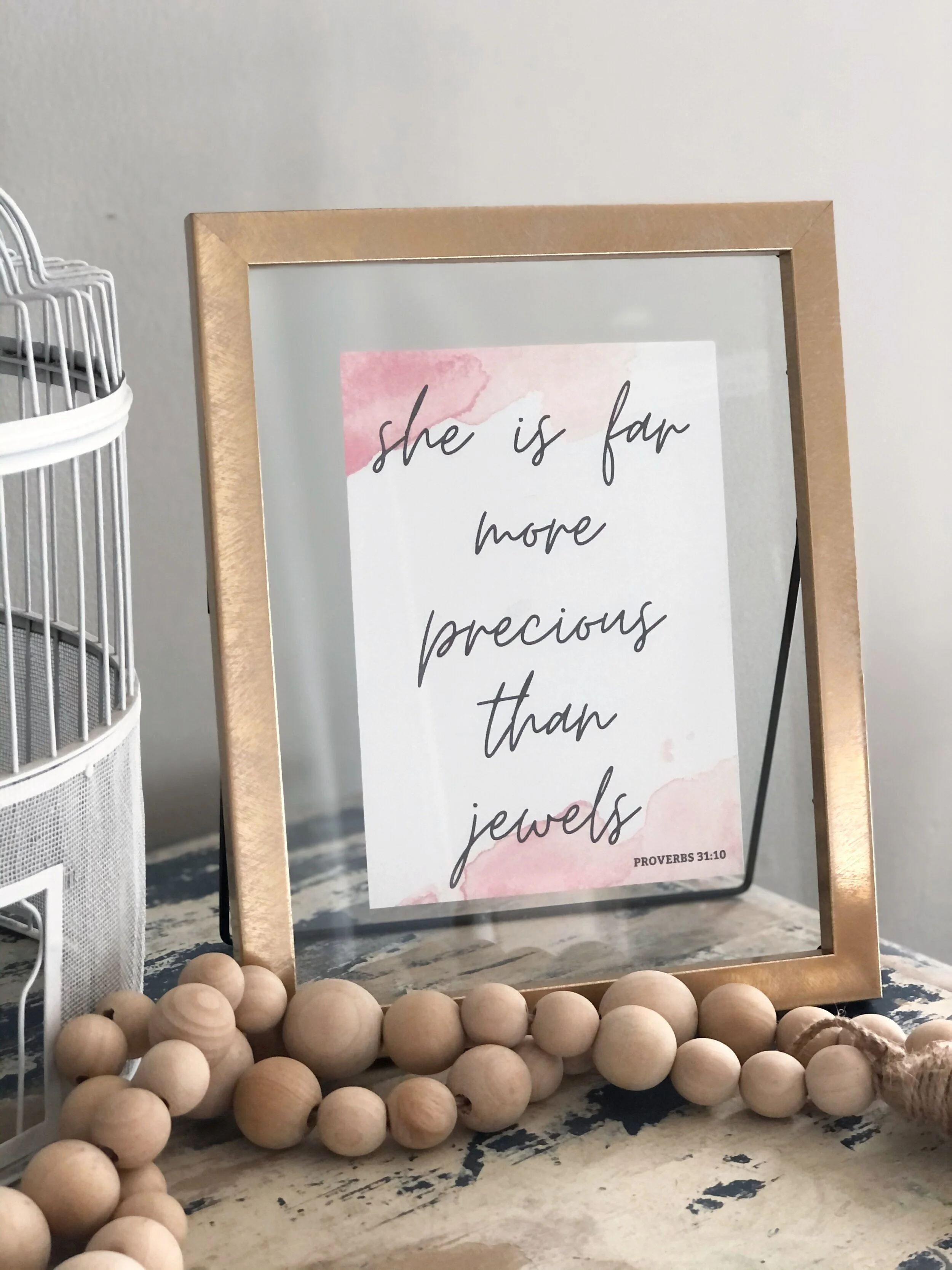 She is far more precious than jewels free printable sign. Watercolor geometrical theme proverbs 31:10 free print. Print your own girl, teen, tween biblical printout.