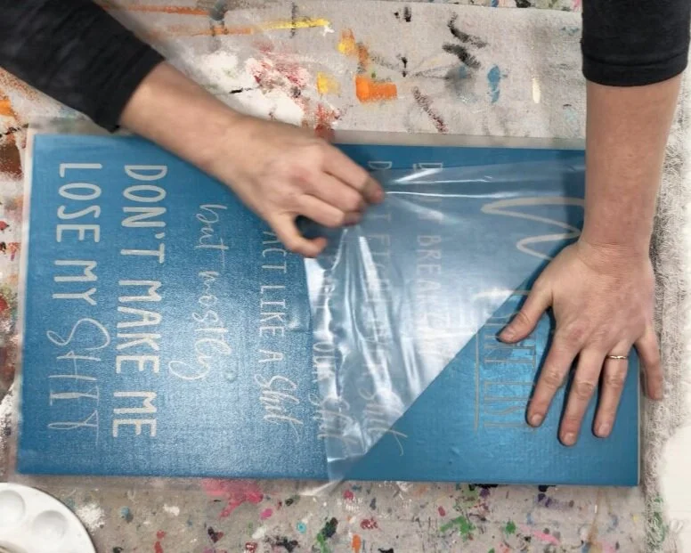 How to stencil on wood using your Cricut. DIY mom's shit list wood sign free SVG. How to paint a lettered wood sign step by step tutorial with pictures.