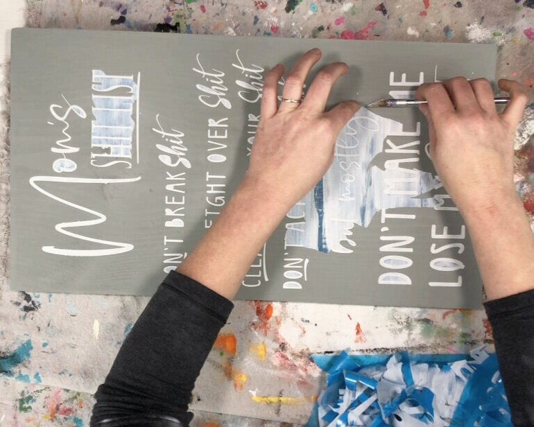 How to stencil on wood using your Cricut. DIY mom's shit list wood sign free SVG. How to paint a lettered wood sign step by step tutorial with pictures.