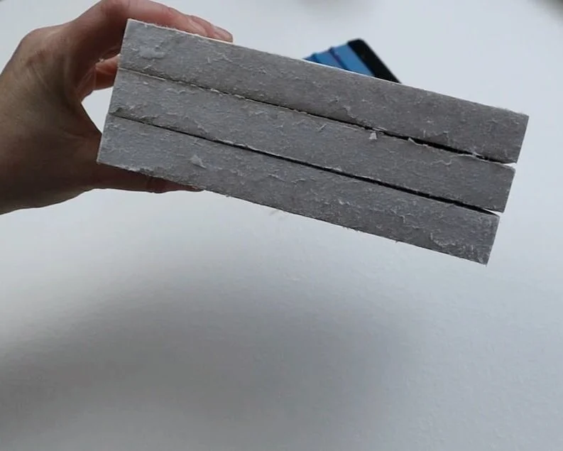 DIY farmhouse book stack using real book and vinyl decals from your Cricut cutting machine. Make your own simple rustic book stack easy & simple from Dollar Tree books.
