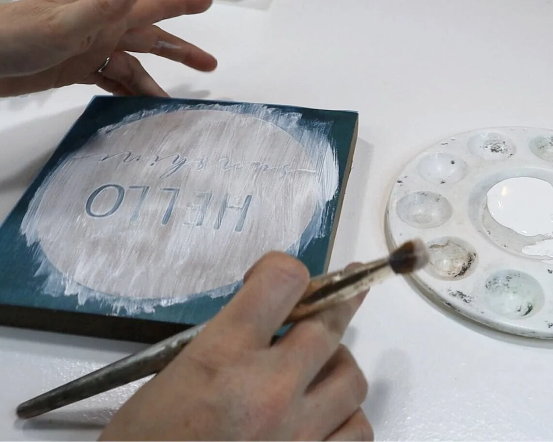 DIY how to stencil on wood sign painting tutorial. How to make a hello sunshine lettered sign for summer. Using oramask stencil film to paint wood signs without paint bleed. free svg to use with cricut for sign making.