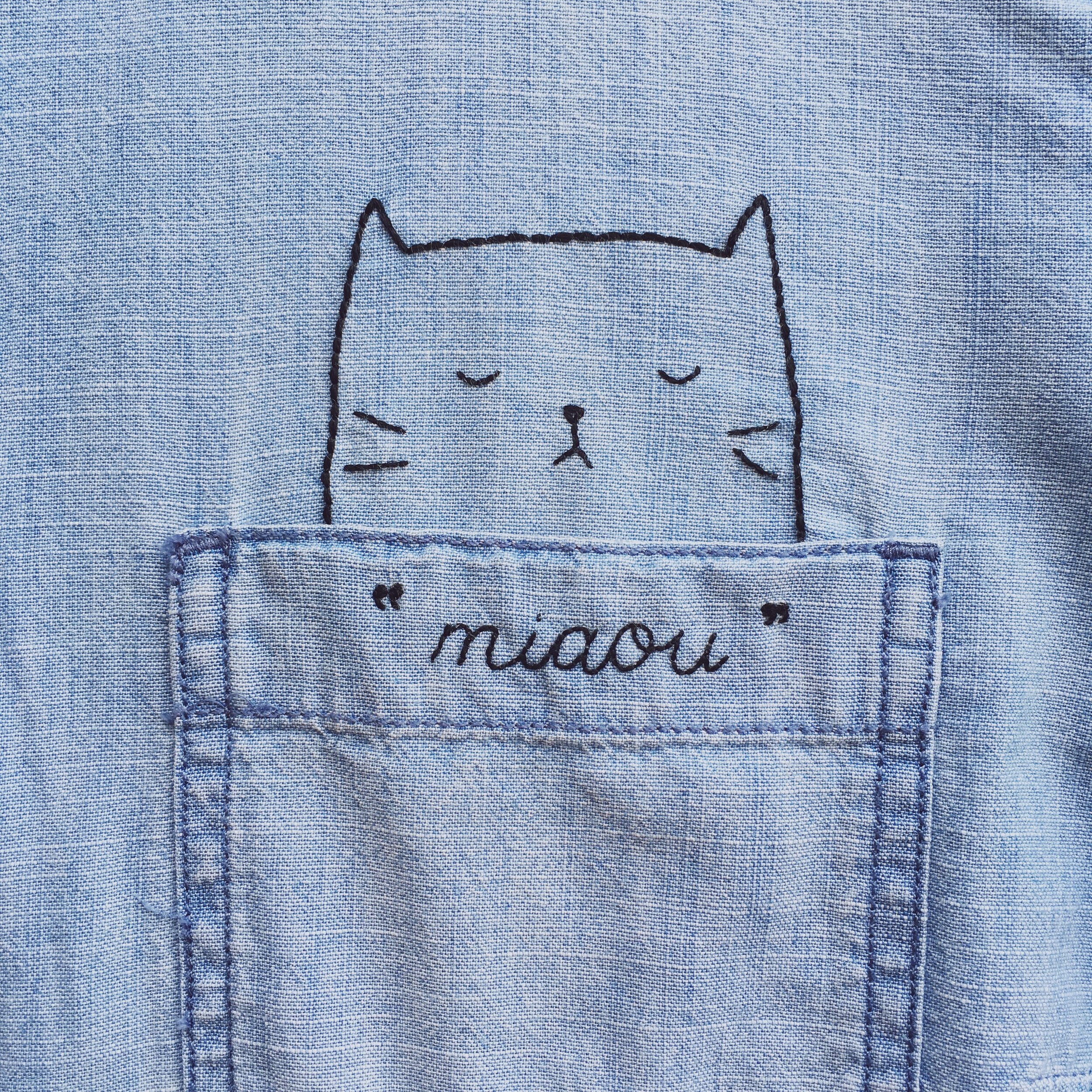 cat embroidered in pocket