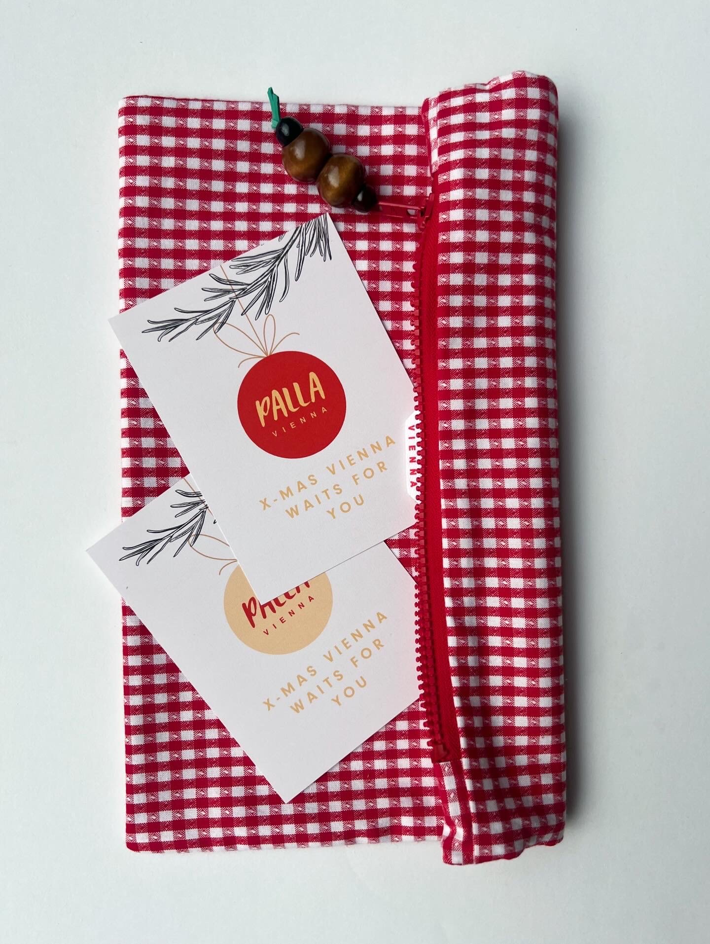 Geschenk Gutschein in Zipptasche