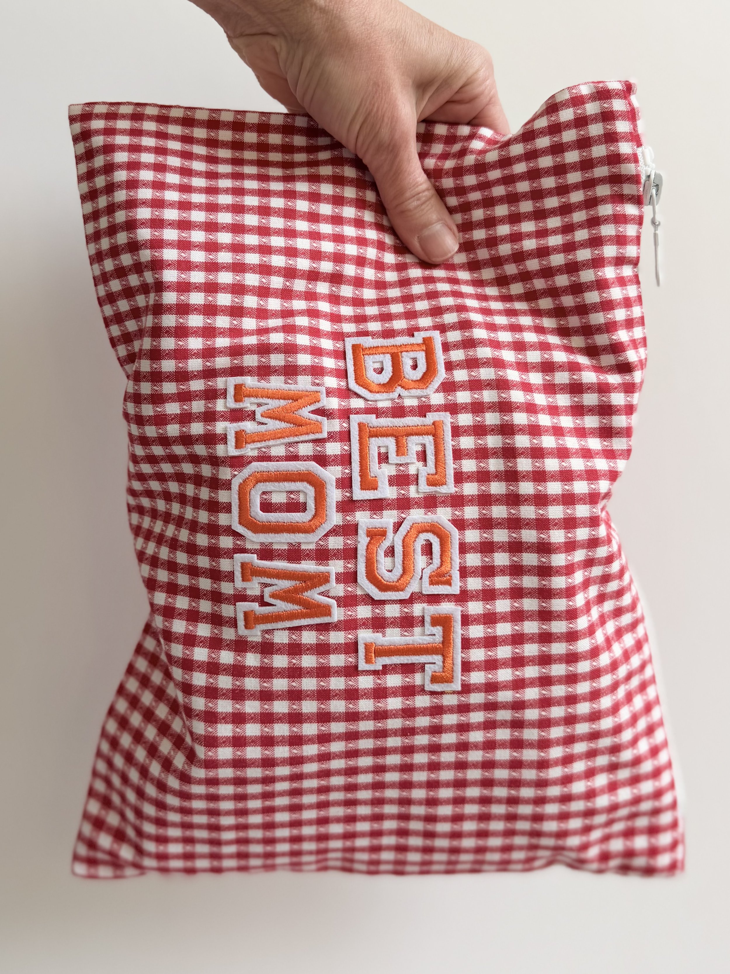 Geschenk Gutschein in Zipptasche