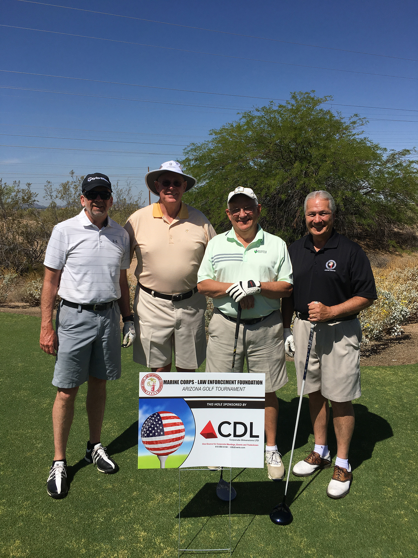  Foursome of Terry Sullivan, Bob Geriot, Jake Egan, John Bennett. Bob Geriot is the owner of CDL (see sponsor sign in photo) and the Golf Shirt Sponsor for this year (and last year's) tournament 