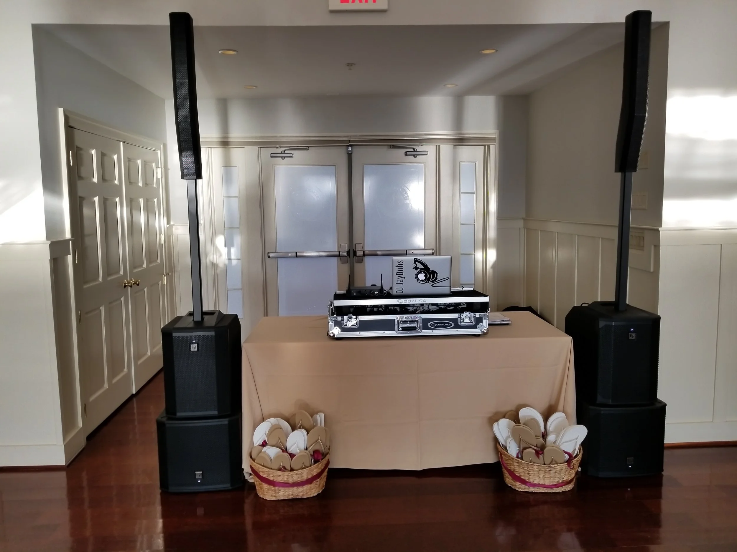 Our new EV Evolve50 vertical array speakers perched on top of matching EV 12” sub-woofers make for a clean presentation and they pack a 3,500 watt punch at CBBC’s Beach House. Check out the client’s flip flop basket - a great idea that allows the ladies to be more comfortable on the dance floor.
