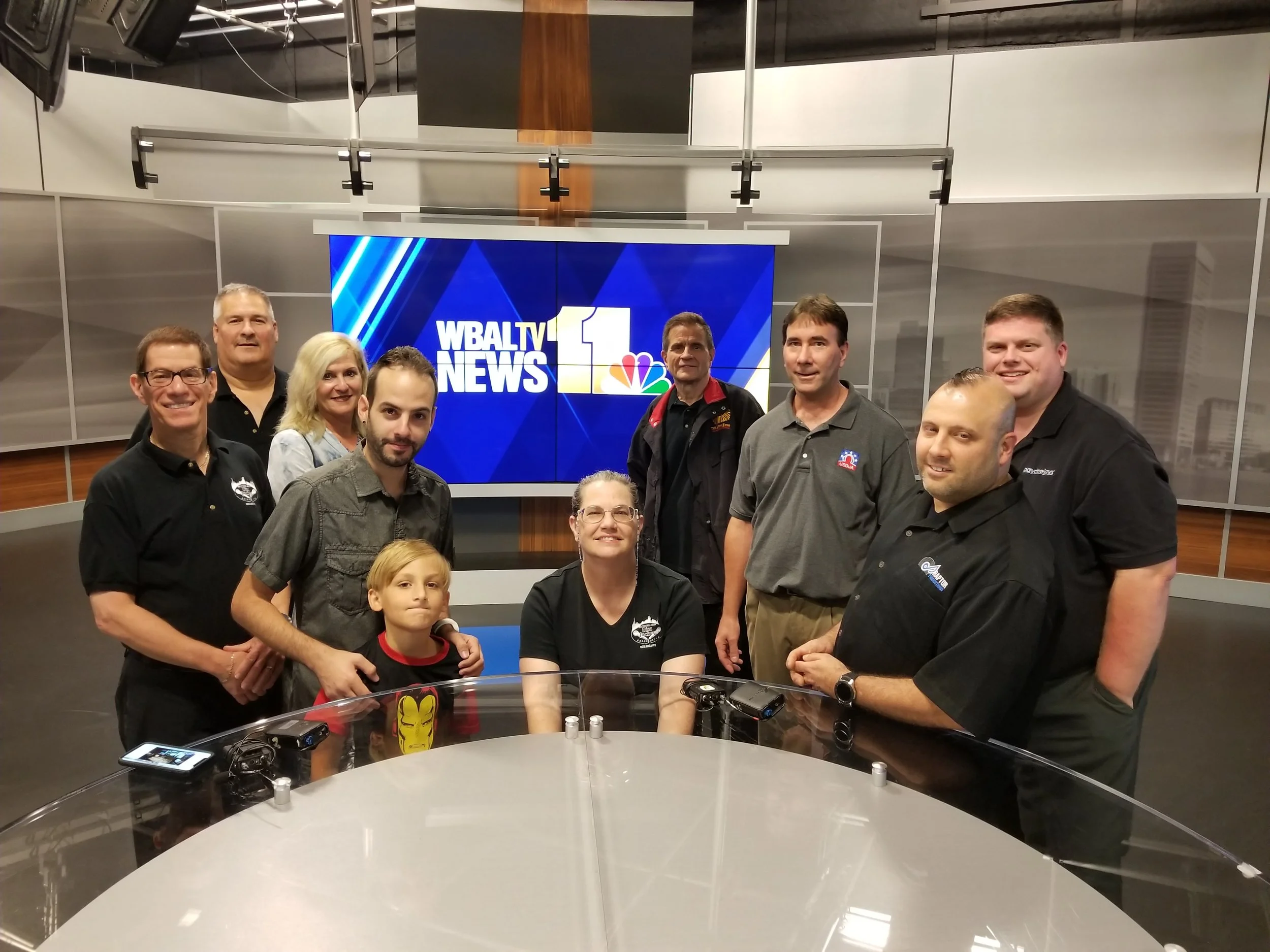 Jason (back, far right) and some members of the Baltimore Area Disc Jockey Association visit WBAL-TV, WBAL Radio, and 98Rock, all part of our monthly continuing DJ education.