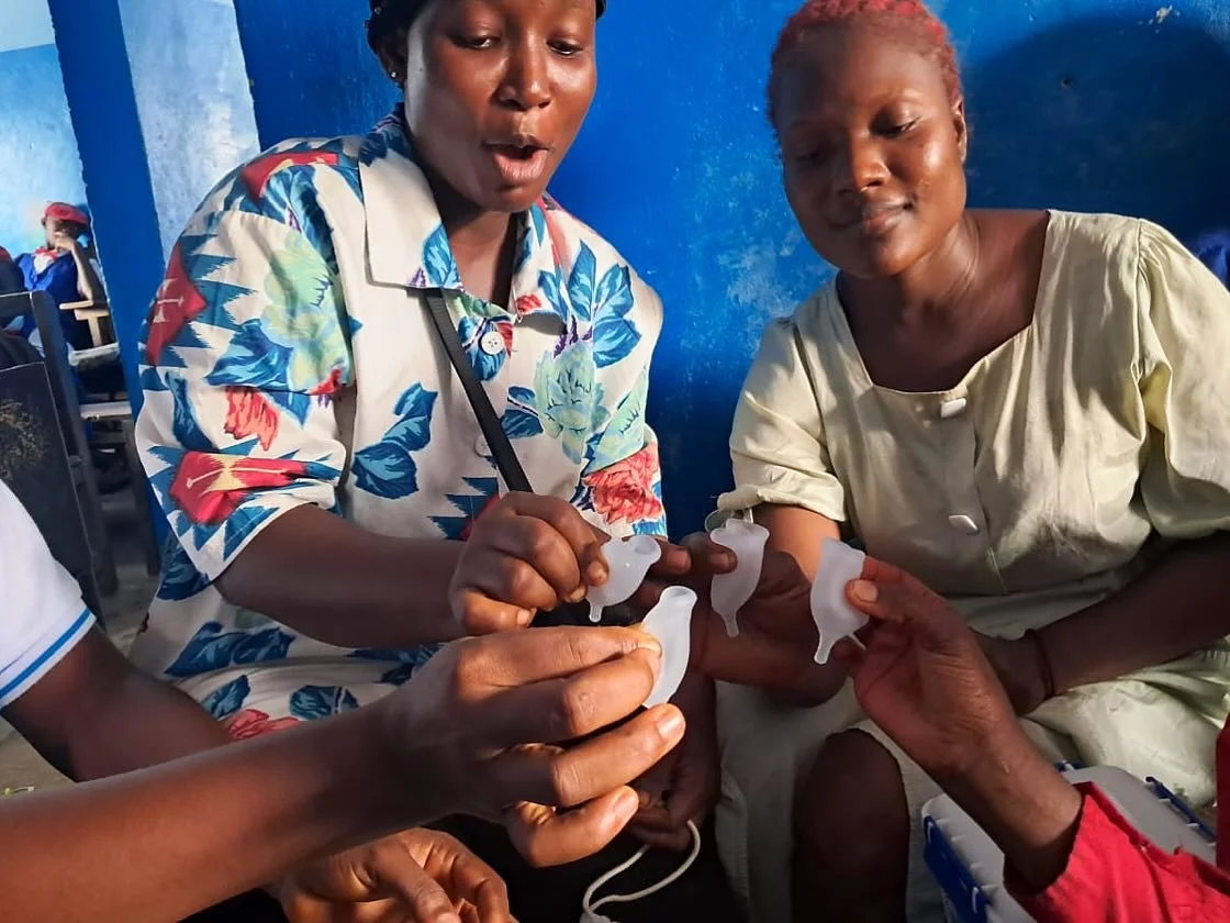 Practicing folding the cup is a core part of our training sessions. Everyone has to get a feel for our two suggested folds, the C-fold and the push-down fold. Often this moment, where the group masters it together, is a breakthrough moment. Laughter,