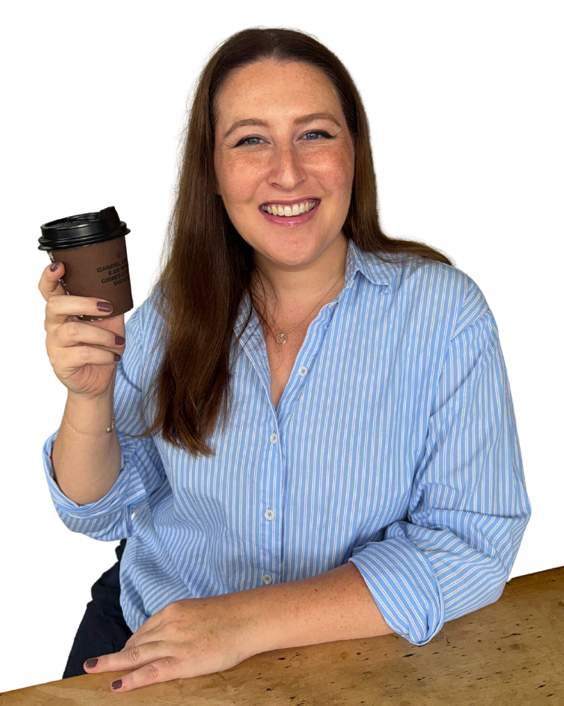 Geena Dunne, Founder and CEO of The Cova Project, holding a coffee