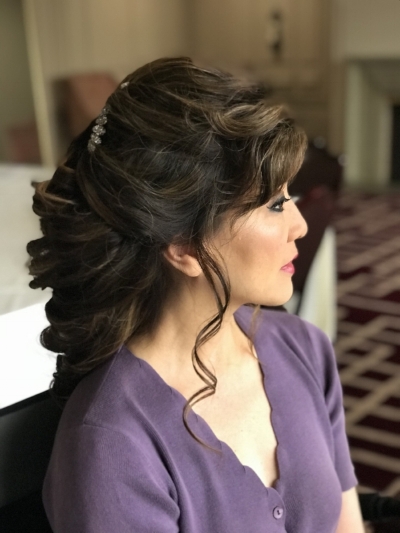 Hair and makeup on a bride from a wedding in Dove Canyon
