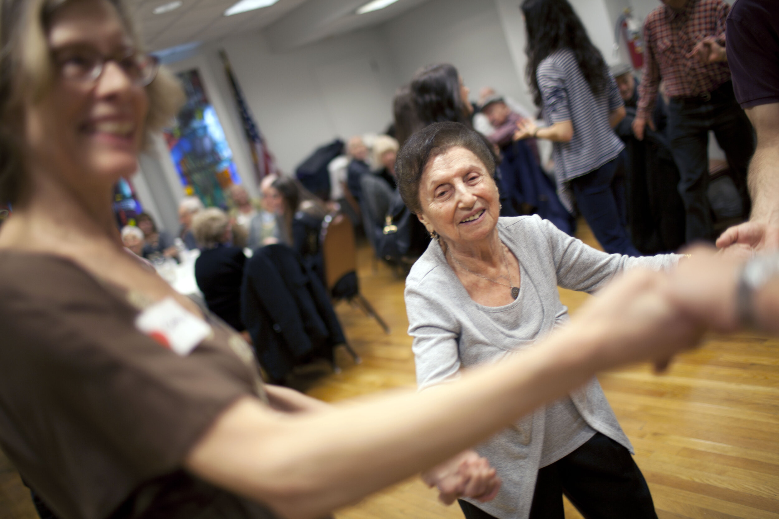 Elderly People Dancing with Volunteers.jpg