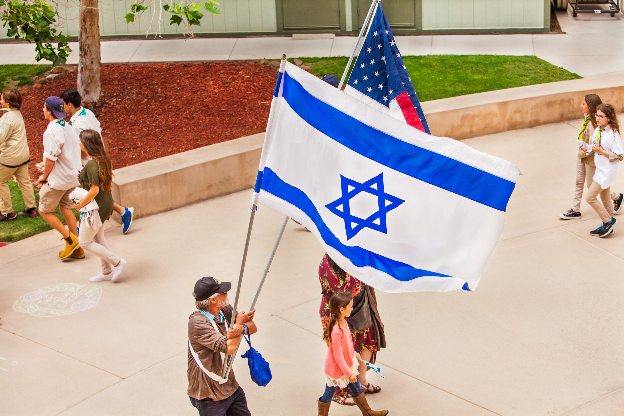 Person Carrying American and Israeli Flags .jpg