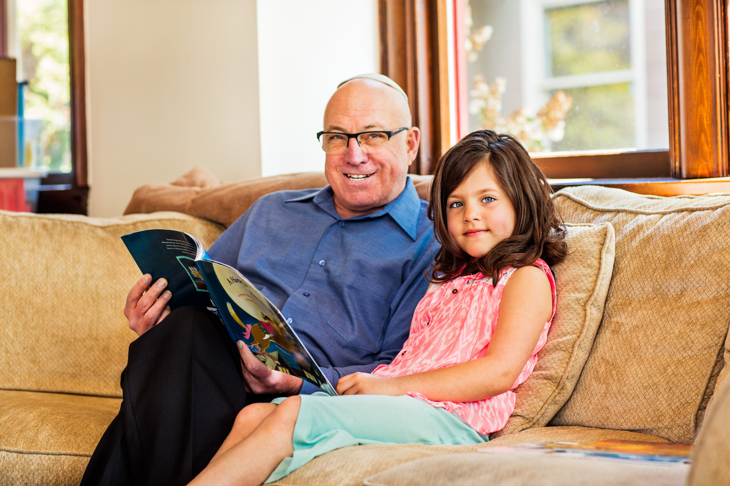 Grandfather Reading Grandchild a Book.jpg