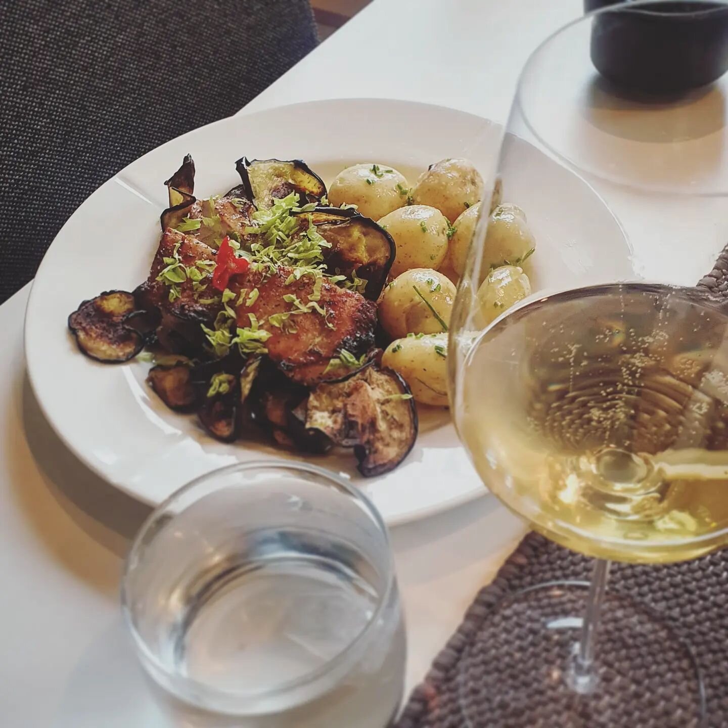 &quot;Chicken &amp; the Egg[plant]&quot; deboned&amp;marinated chicken thigh with eggplant two ways and steamed potatoes with sauce. Grippy Argentinian blancs de blanc 🥂 (#Brutnature or bust). ...I miss this chicken #homleg&aring;rden (!) but good t