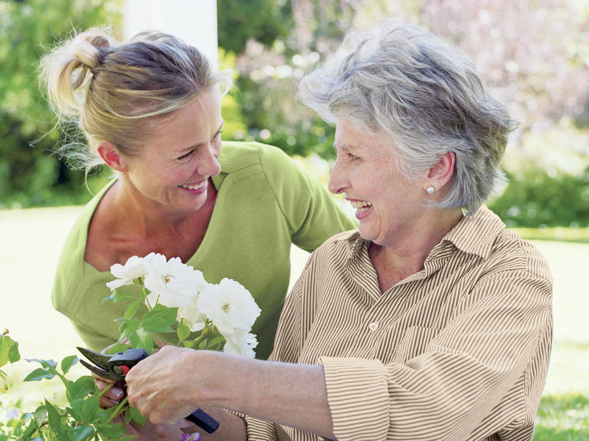women with carer and flowers.jpeg