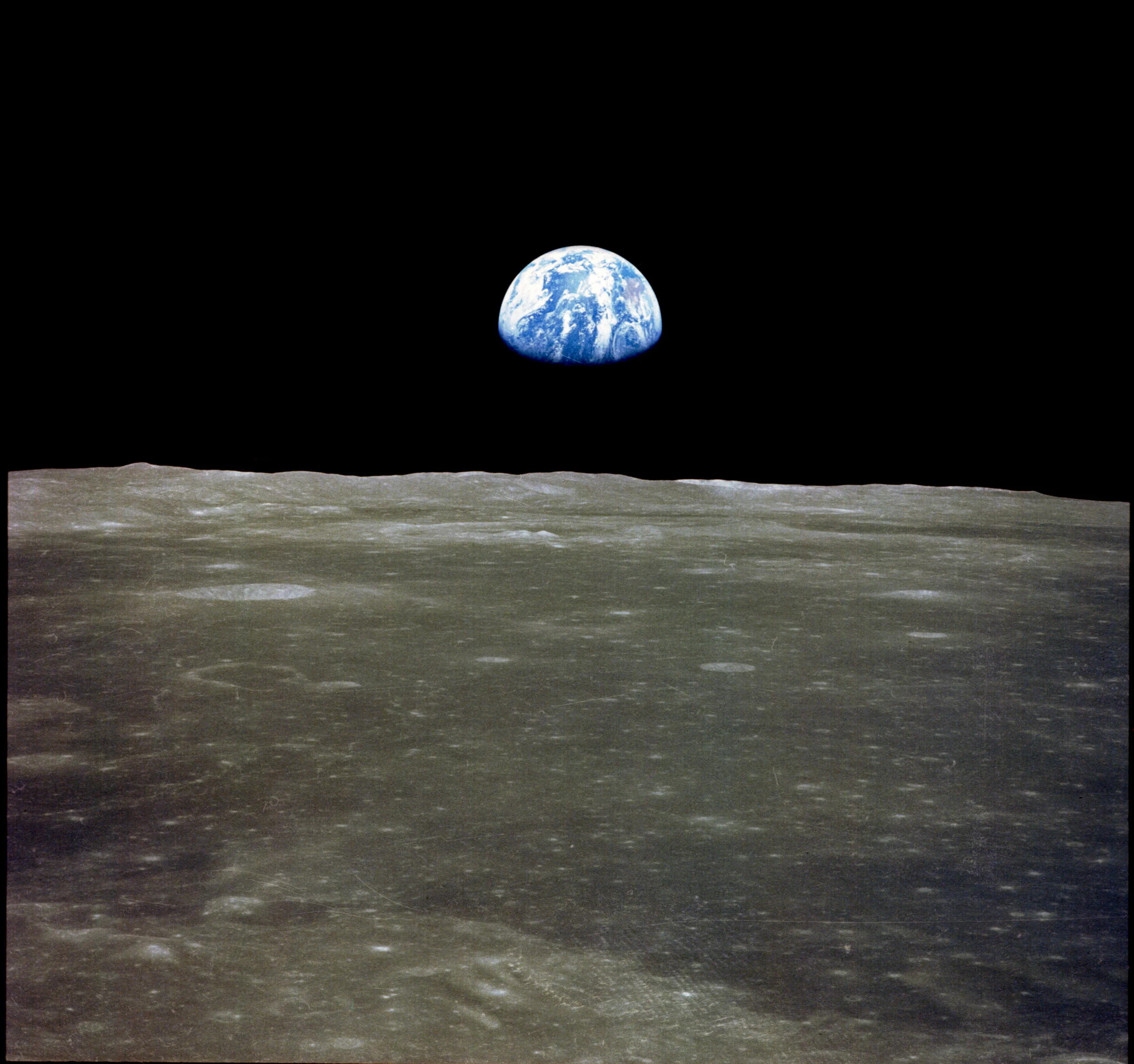 Earth rise as seen from Apollo 11. Photo credit .