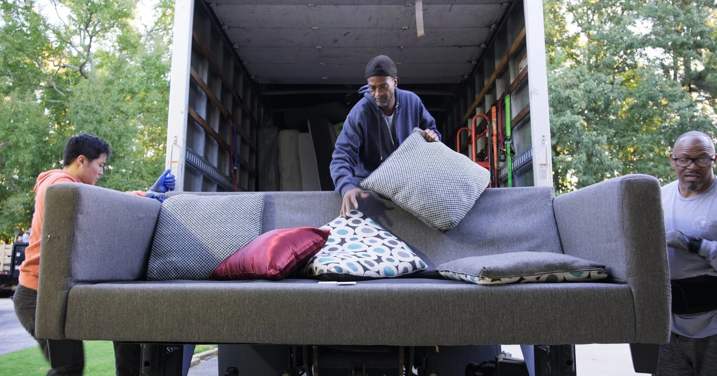 Loading Sofa on Truck 2_1.35.1-topaz-faceai-sharpen copy.jpeg