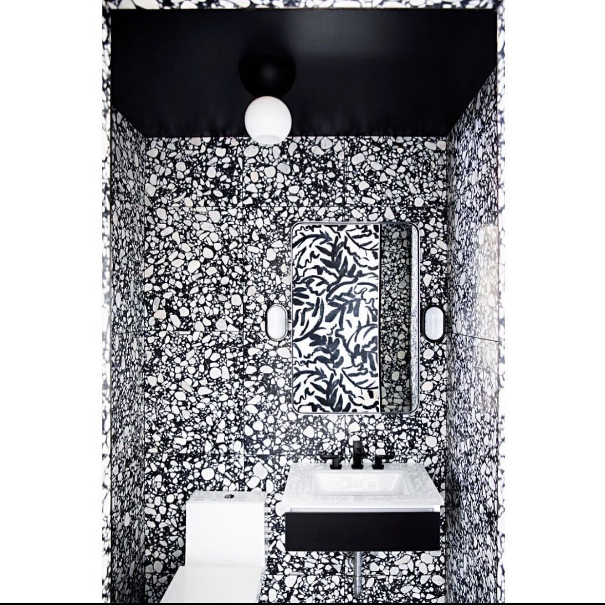 A black and white terrazzo powder room 🖤🤍 Designed by @sashabikoff 
📸: @brittanyambridge 
⠀ 
#powderroom #sashabikoffinteriordesign #sashabikoff #terrazzo #terrazzodesign #blackandwhitedesign #nycinteriordesign