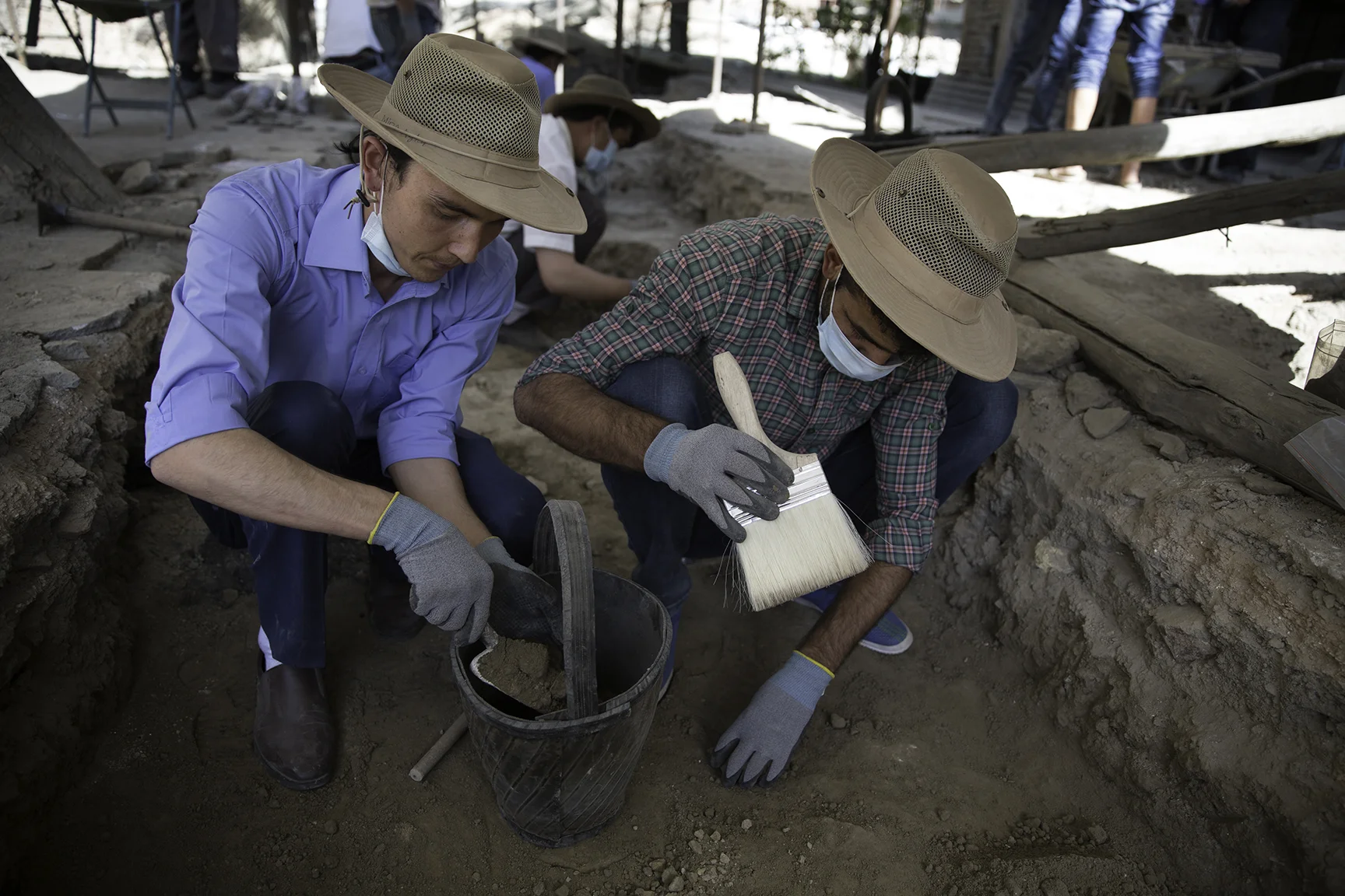 Students sift through the foundation underpinnings of the damaged mosque searching for artifacts and found the remains of an earlier seventeenth-century building, which is rare in Kabul.
