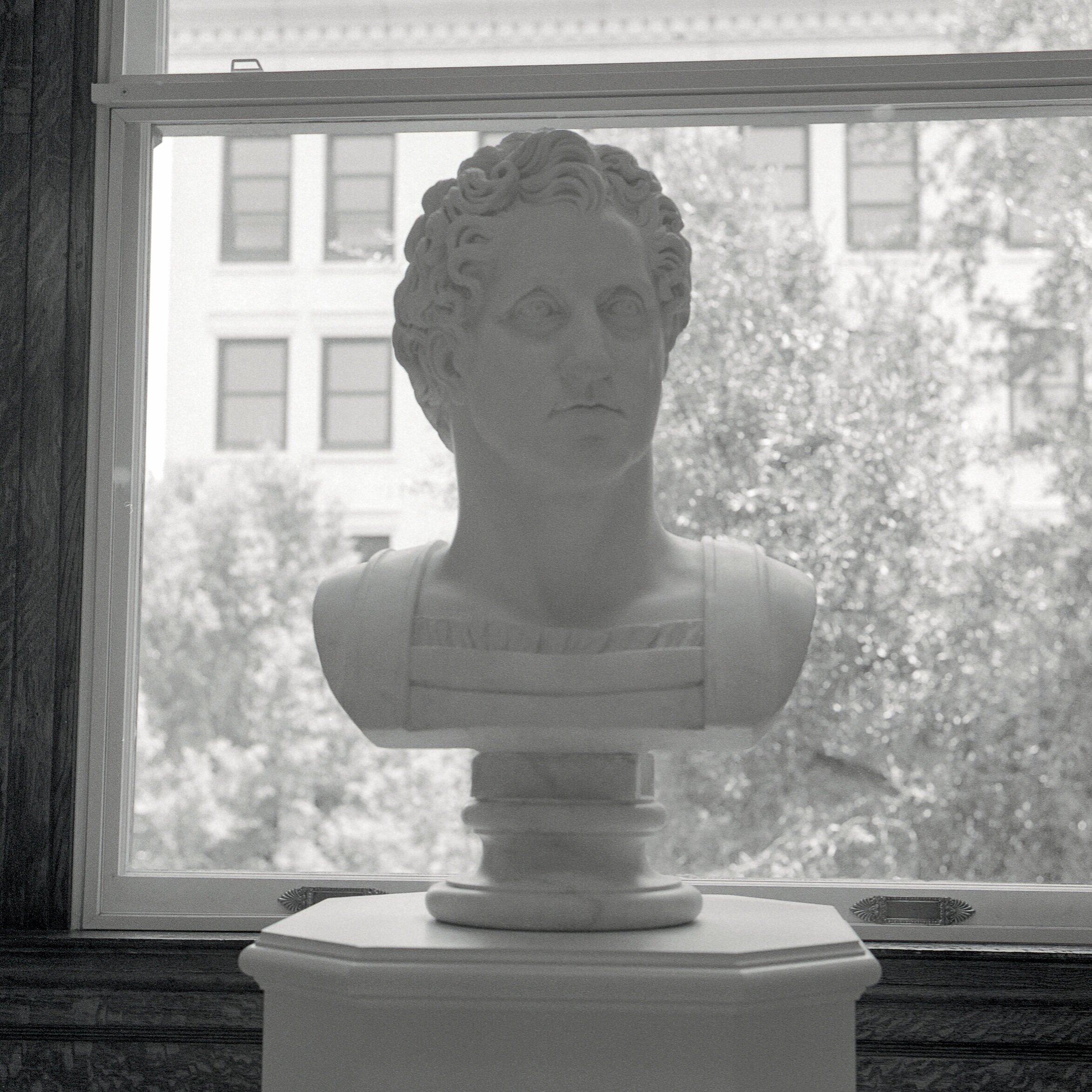 Marble bust of George Washington, done in the style of a Roman emperor