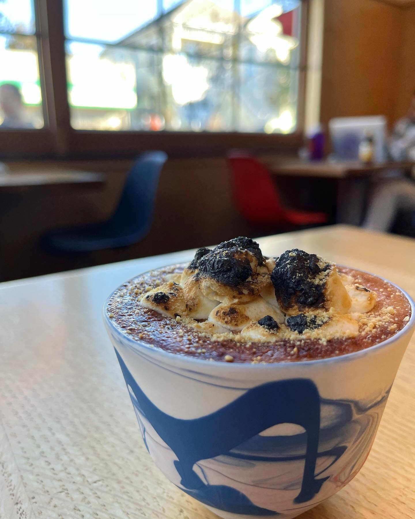 Our extra Lush S'mores Latte 🤎| featuring @guittardchocolate,  steamed milk, toasted marshmallow, and a graham garnish | add espresso for only $1 💘