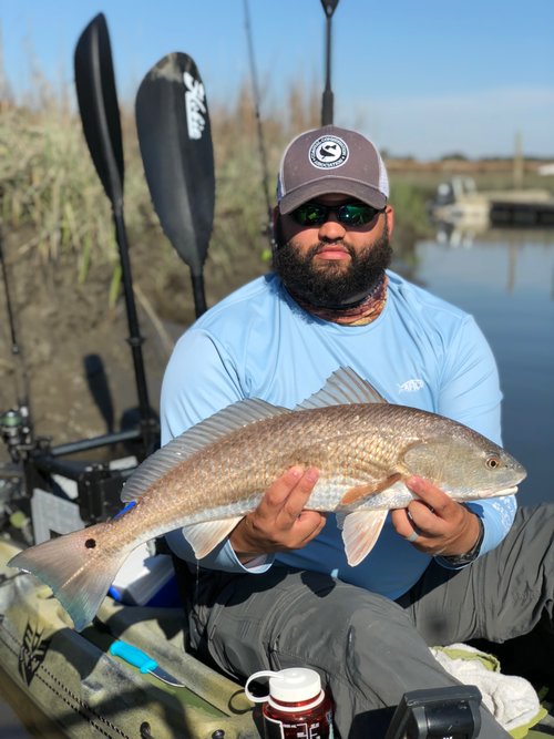 Levi Holding Beautiful Red Drum in Hobie