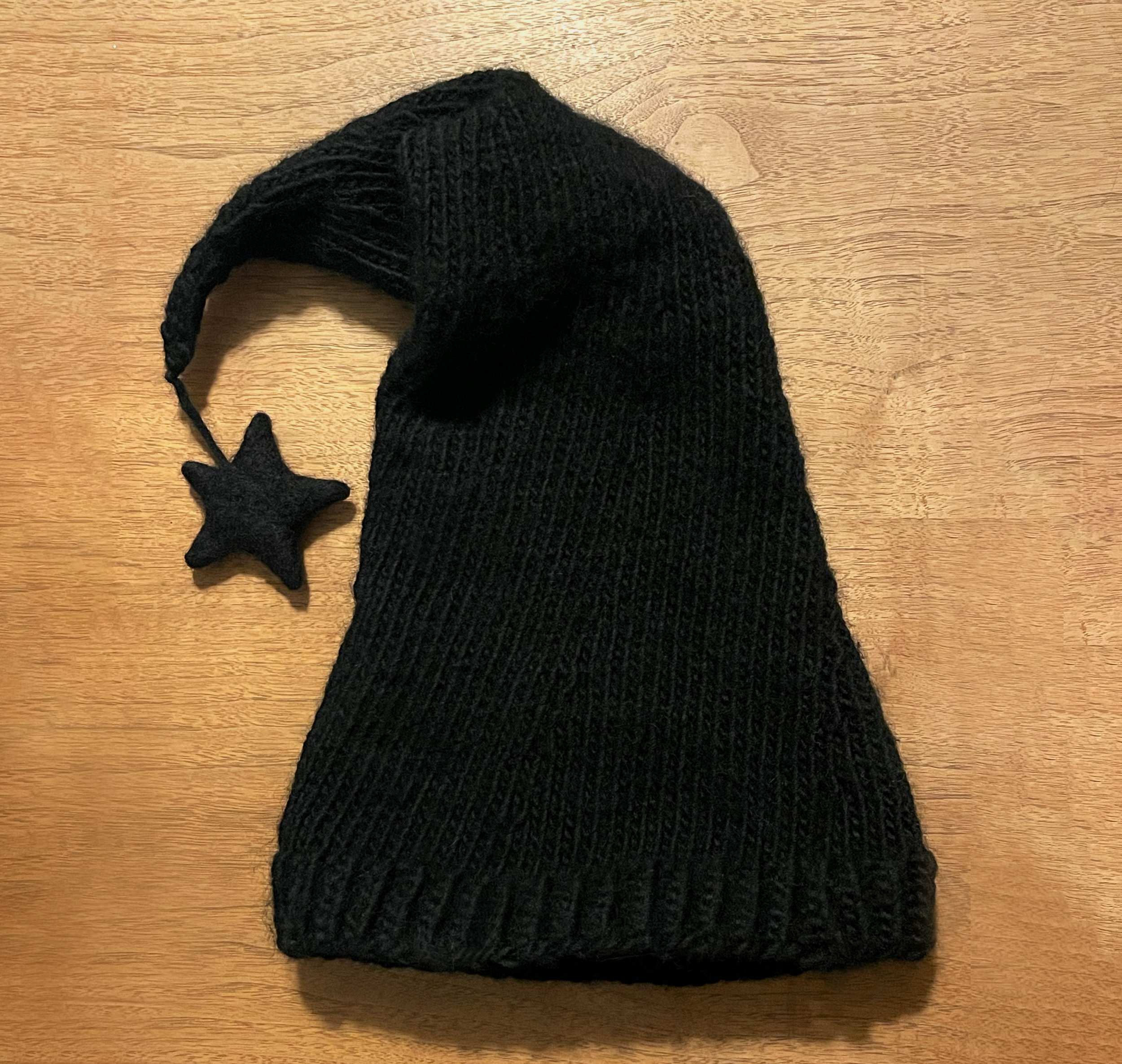  knit sleeping cap with felted star 