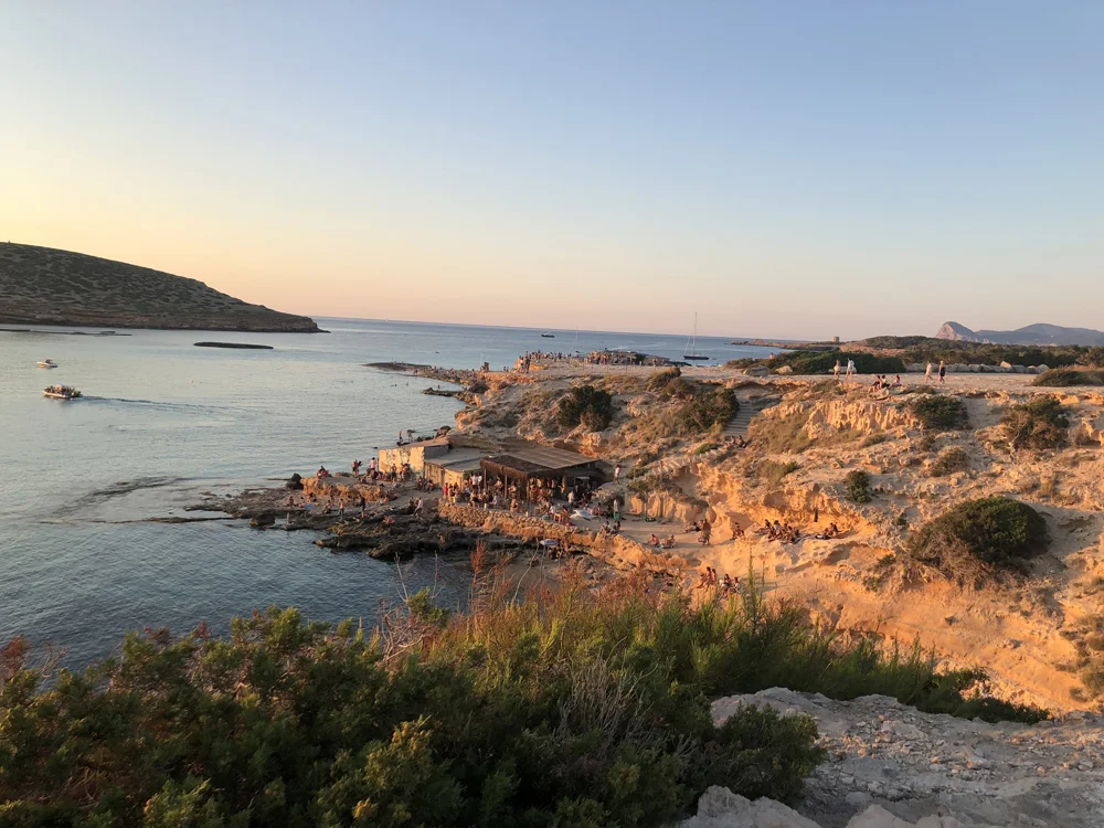 The cliffs and beach looking to the sunset, everyone got a personal ray blasting across the water to their eyes