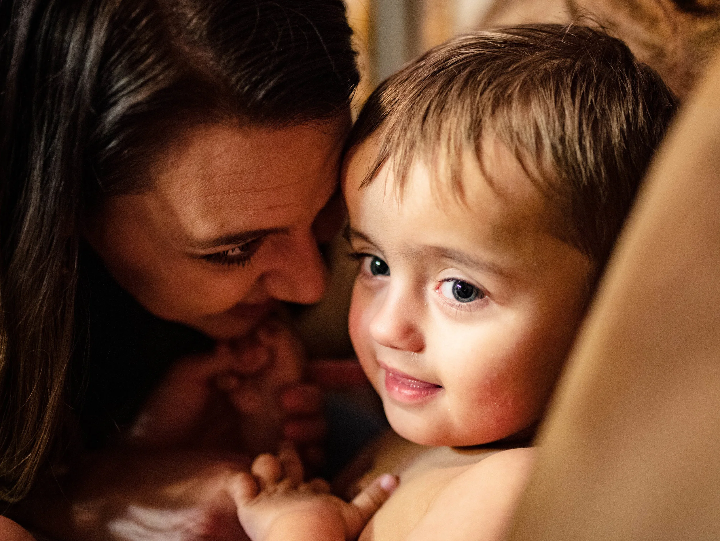 Amanda Jordan, Kam's mother, tickles him after changing his diaper before bed Thursday, March 21, 2019 at their home in Selma, Ind. Amanda and Kam's father, Kieth Kadinger are both heterozygous carriers of Accute Intermitant Porphia (AIP) disease. K
