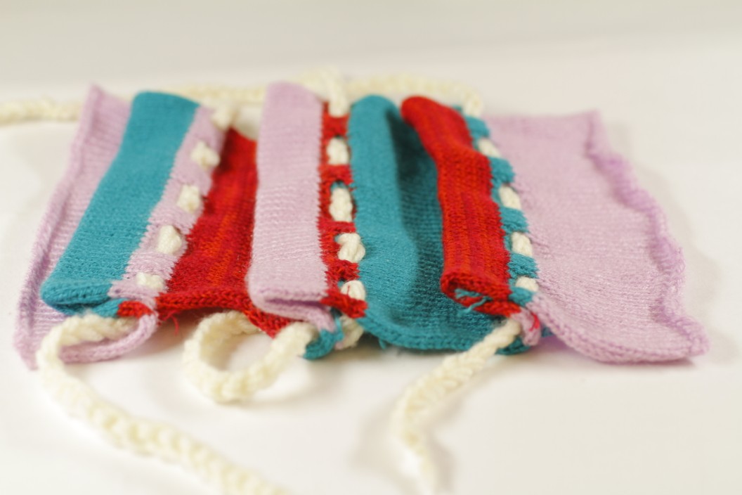Strapping Rows on Silver Reed SK280: Mercerized Cotton 8/2, Merino Wool 6/3, and Acrylic 6/3.