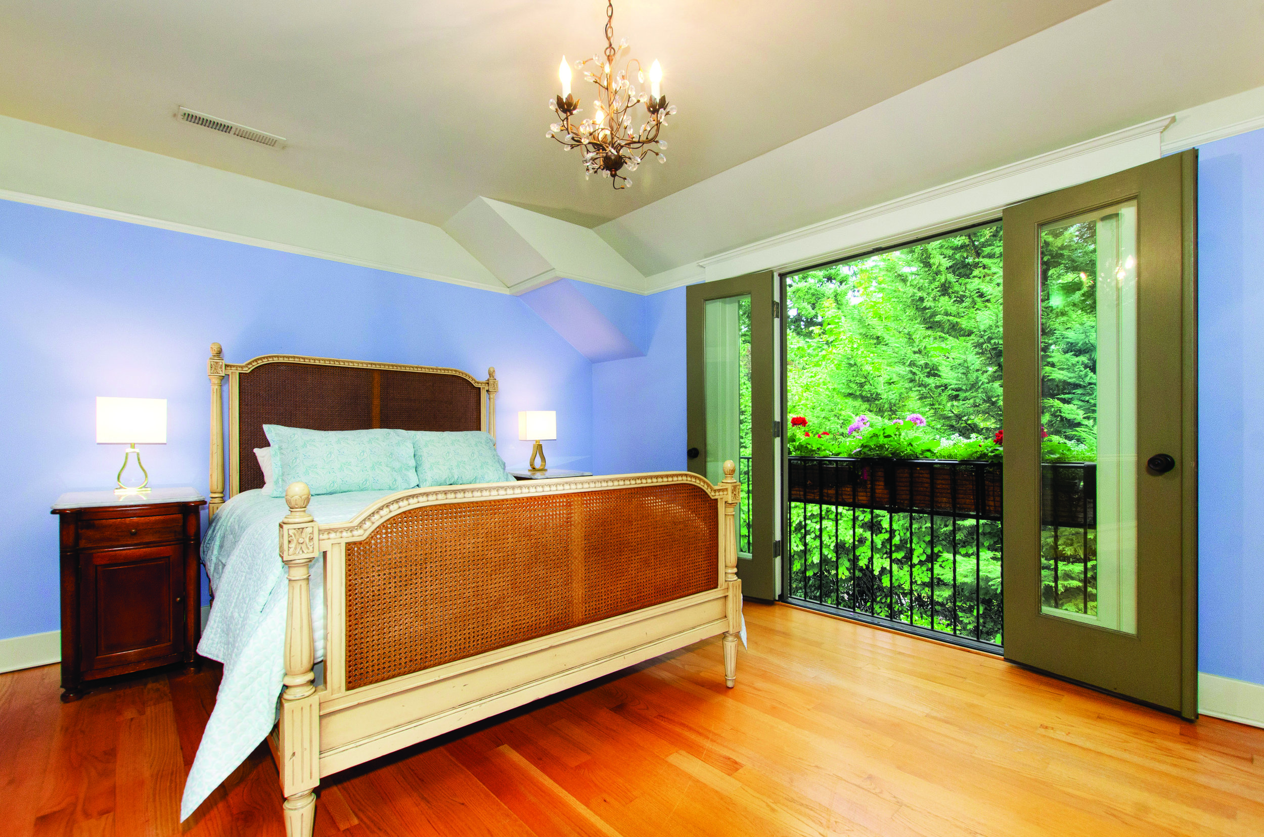 Home features a bedroom and full bath on the main floor, and three bedrooms and full bath with radiant floor heating on the upper floor.