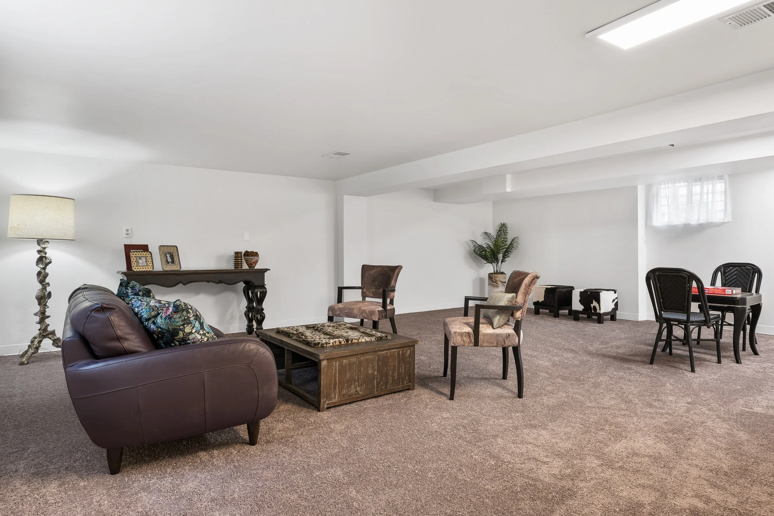 Remodeled family room, full bath, washer & dryer and door to the exterior—ready for guests, a teen hangout, or even a separate apartment.
