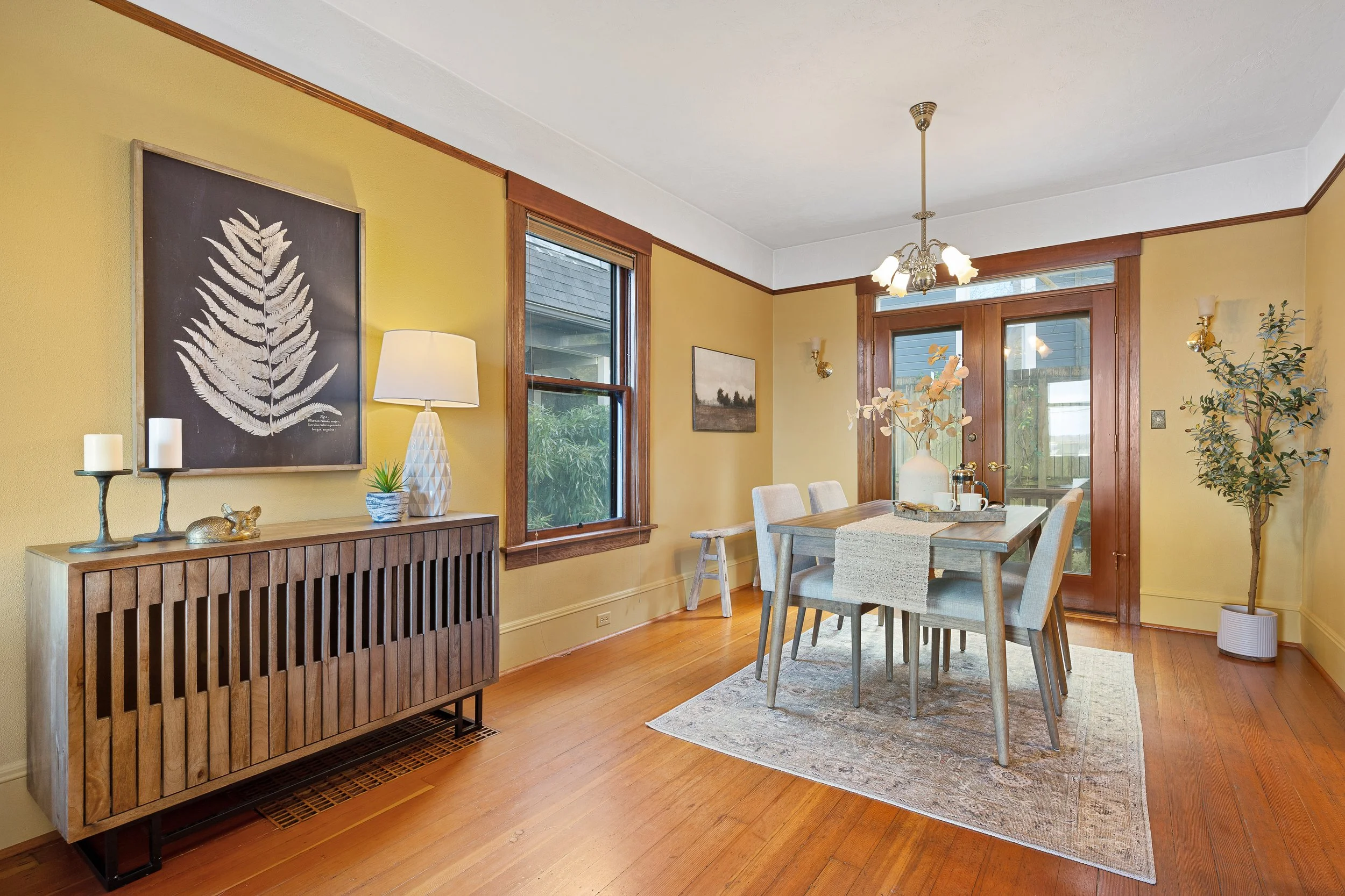  Fabulous flow with a spacious living room filled with natural light, a separate dining room with French doors opening to the outdoors. 