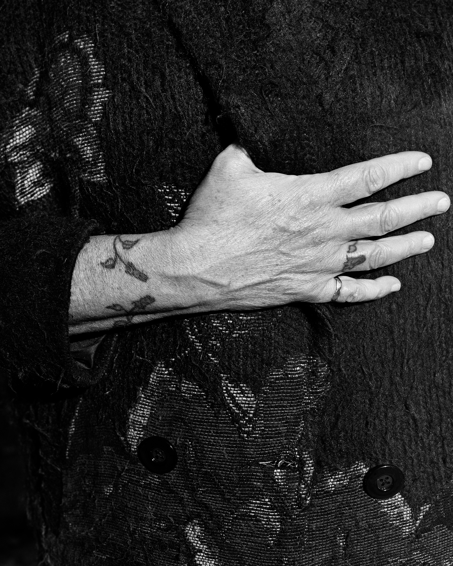 Mom's Hand with Jacket.jpg