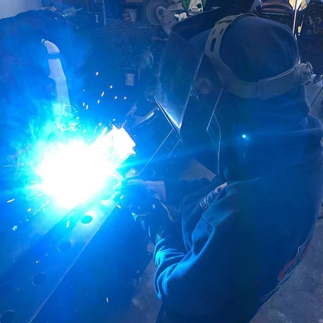 A little hot forming and welding lesson today.  Not to shabby for his first time! #wilmingtonironworks #welding #5thgeneration