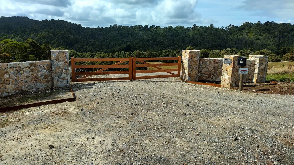 Wooden Driveway Rail Gates in Stone Piers