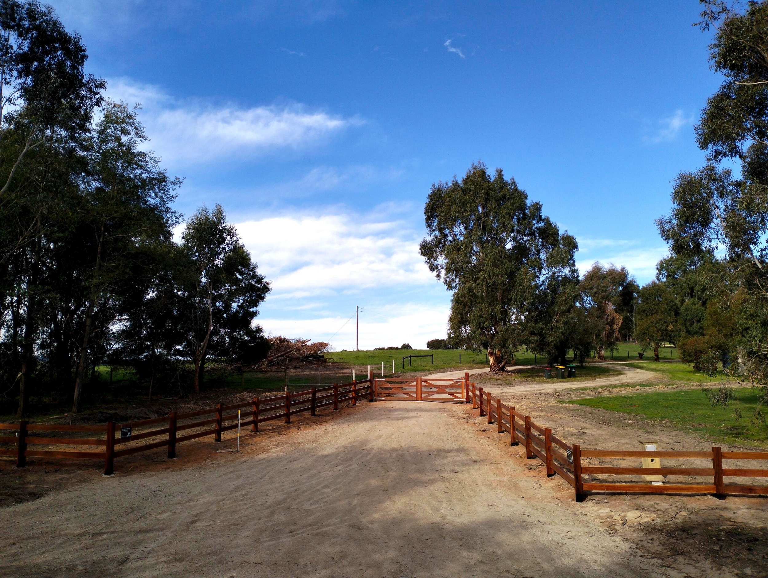 Ironbark Post and Rail Fencing with Double Set of Cross Brace Timber Gates.jpg