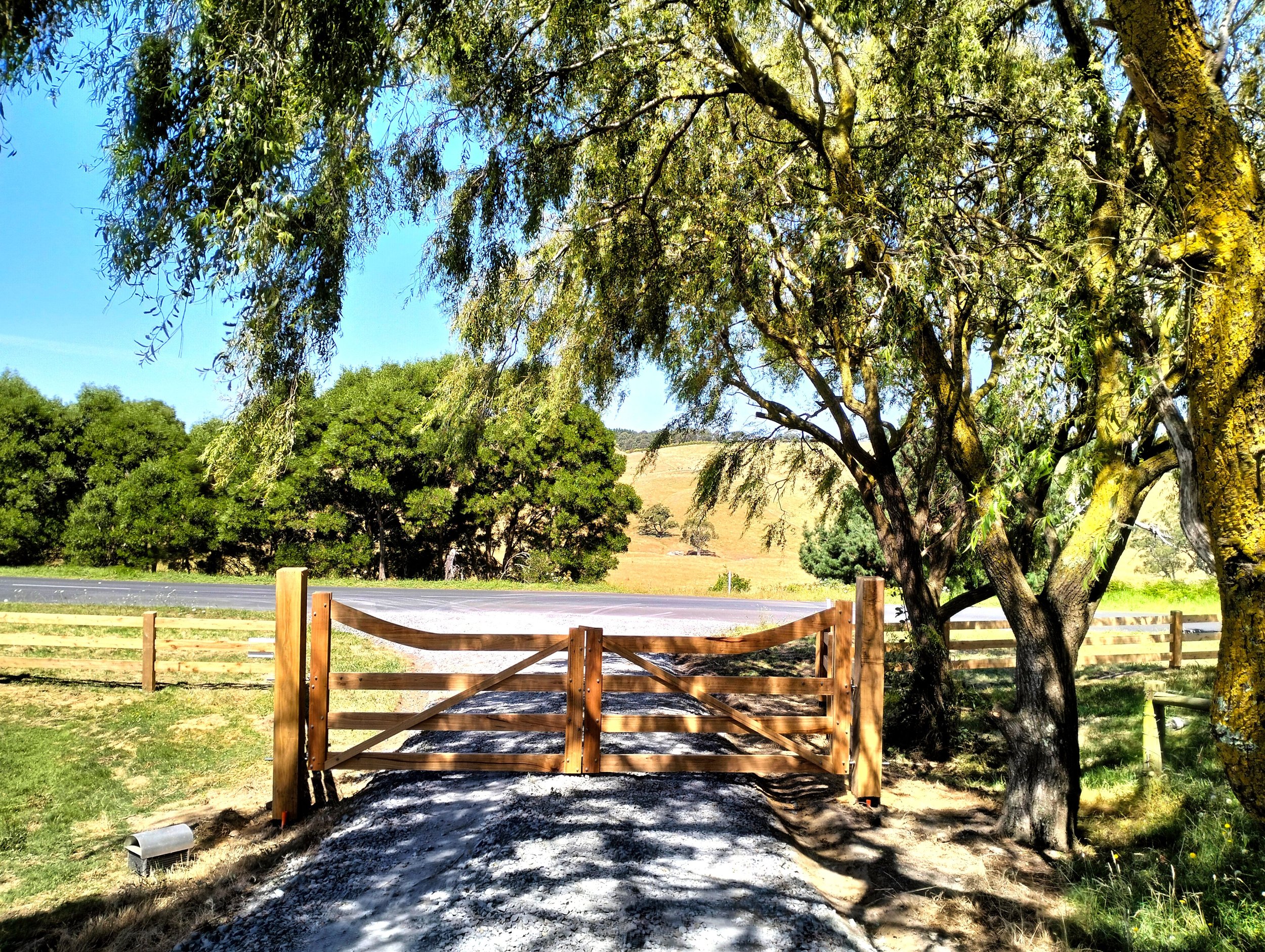 Wooden Rural Farm Gate Opening Outwads.jpg